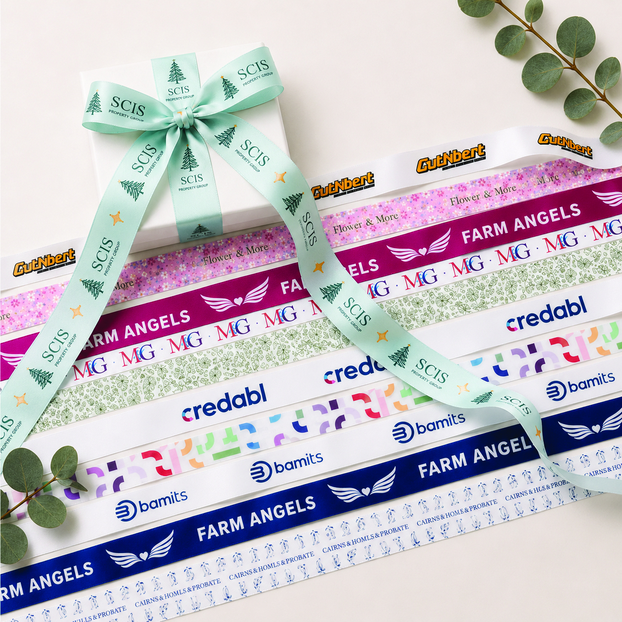 Full colour printed ribbon with vibrant custom logos and detailed artwork on premium satin ribbon for branded gift packaging.